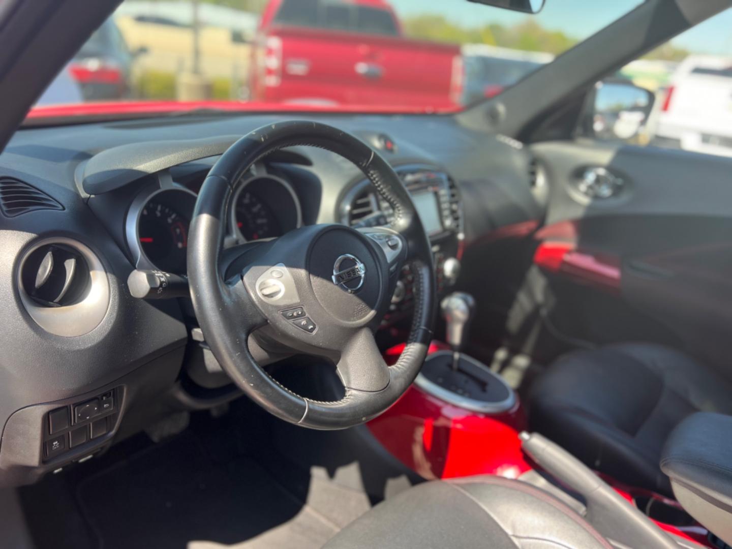 2015 RED Nissan Juke S FWD (JN8AF5MR3FT) with an 1.6L L4 DOHC 16V engine, Continuously Variable Transmission transmission, located at 420 I-35E, Lancaster, TX, 75146, (469) 297-4144, 32.593929, -96.823685 - Photo#1